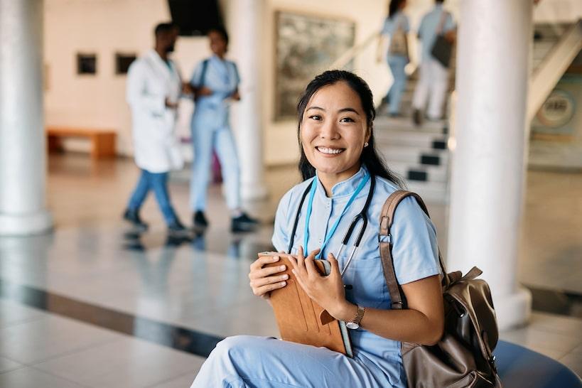 happy asian nursing student at medical university